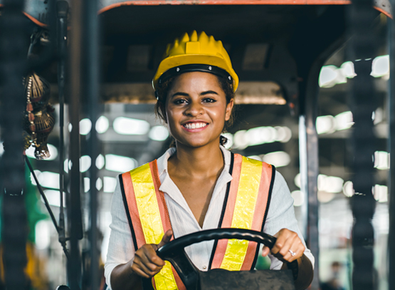stock photo-women-labor-worker-at-forklift-driver-position-with-safety-suit-and-helmet-happy-smile-enjoy-1643242867